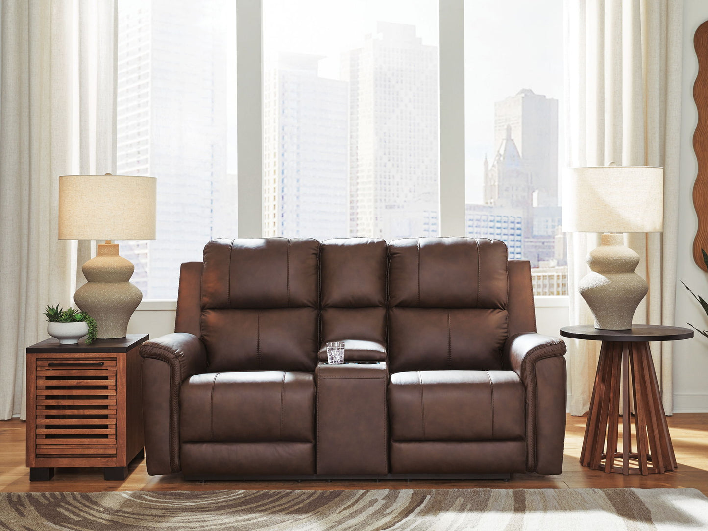 Bleckley - Power Reclining Loveseat With Console / Adjustable Headrest - Hornell Furniture Outlet