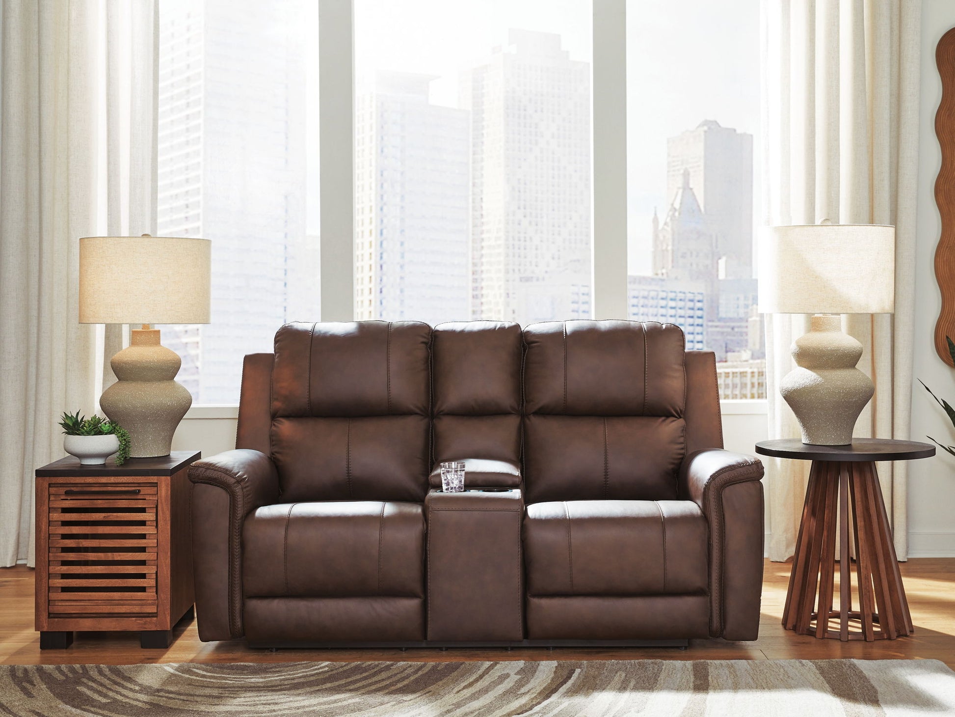 Bleckley - Power Reclining Loveseat With Console / Adjustable Headrest - Hornell Furniture Outlet