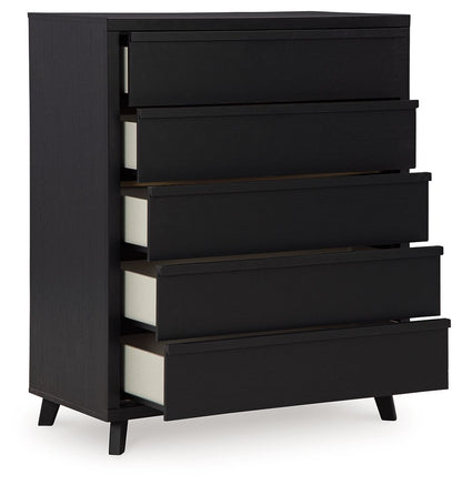 Danziar - Black - Five Drawer Wide Chest - Hornell Furniture Outlet