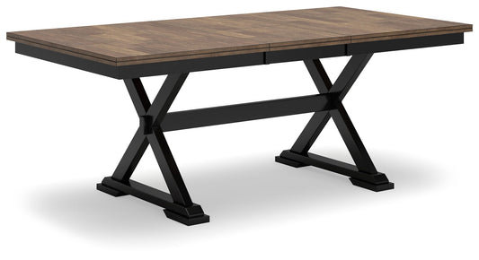 Wildenauer - Brown / Black - Rectangular Dining Extension Table - Hornell Furniture Outlet