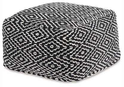 Jasett - Black / Ivory - Pouf - Hornell Furniture Outlet