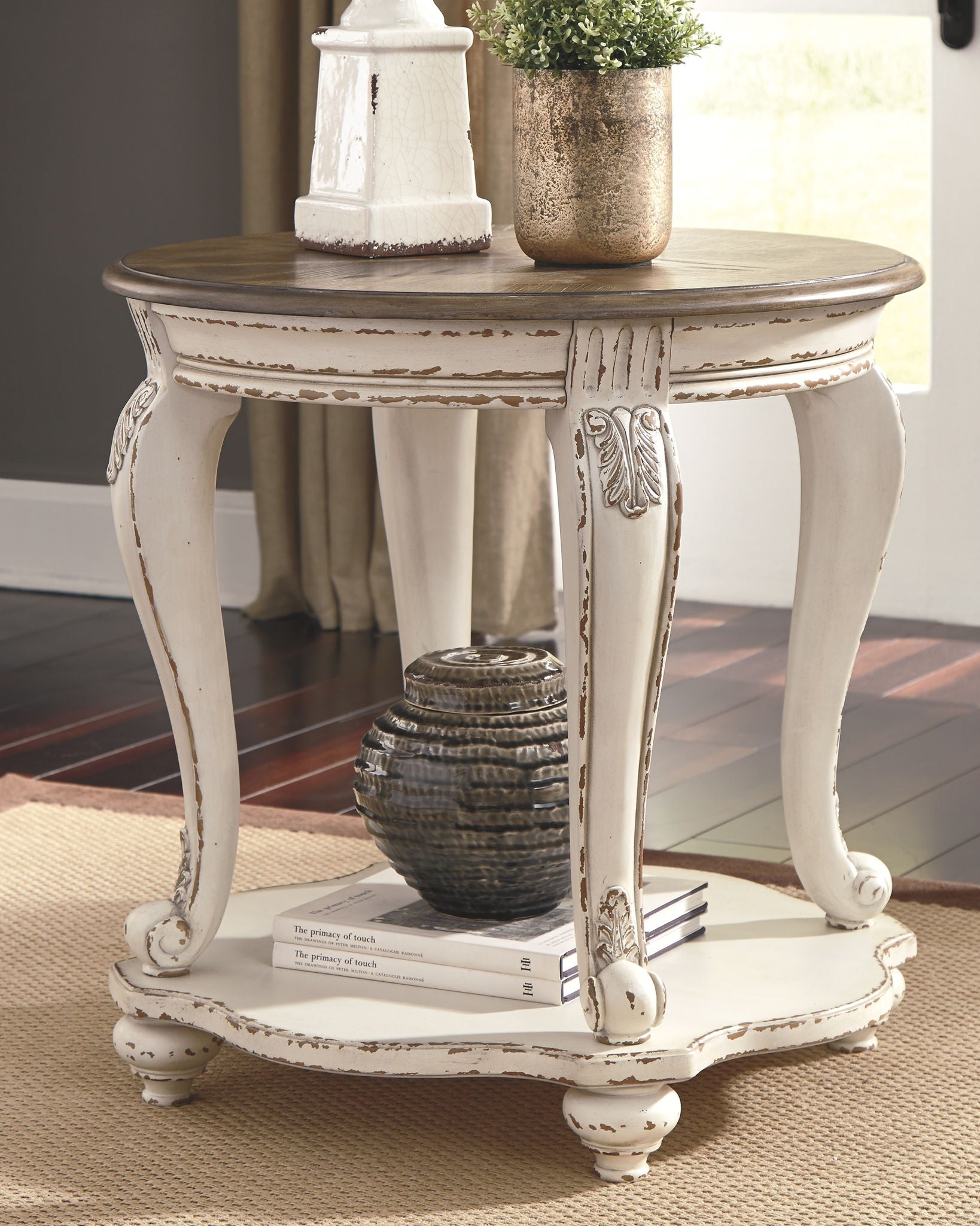 Realyn - White / Brown - Round End Table - Hornell Furniture Outlet