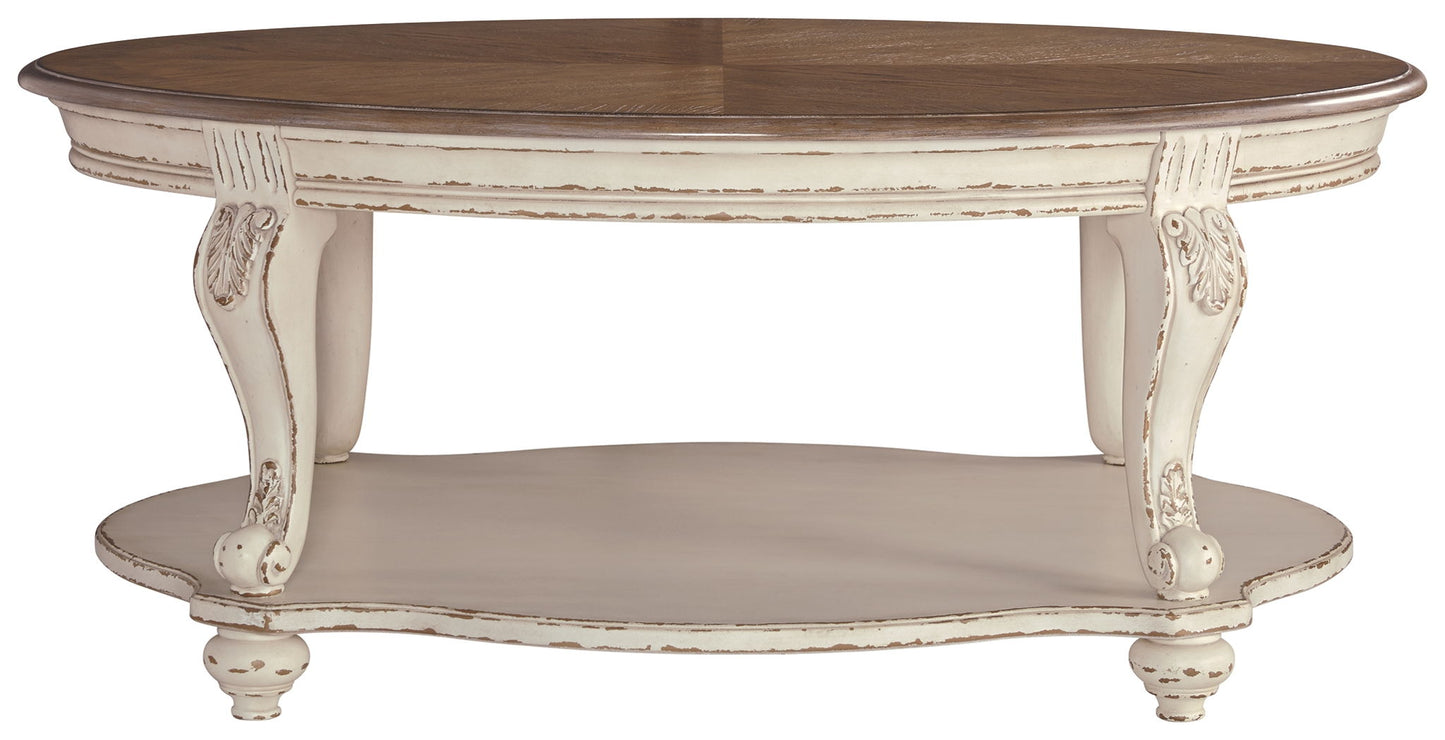 Realyn - White / Brown - Oval Cocktail Table - Hornell Furniture Outlet