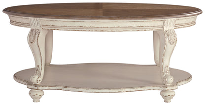 Realyn - White / Brown - Oval Cocktail Table - Hornell Furniture Outlet