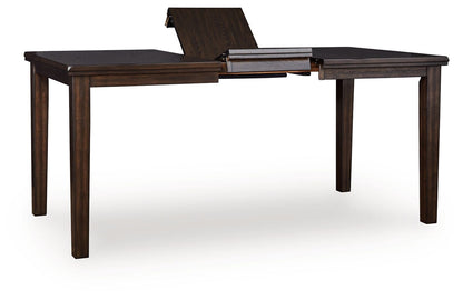 Haddigan - Dining Room Extension Table - Hornell Furniture Outlet