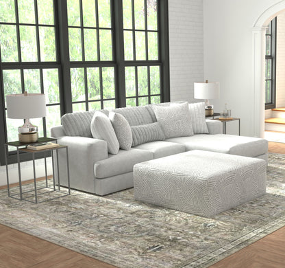 Logan - Upholstered Sectional With Comfort Coil Seating - 46" Cocktail Ottoman And Accent Pillows Included - Hornell Furniture Outlet