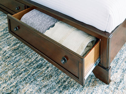 Trellington - Brown - King Sleigh Storage Bed - Hornell Furniture Outlet