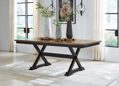 Wildenauer - Brown / Black - Rectangular Dining Extension Table - Hornell Furniture Outlet