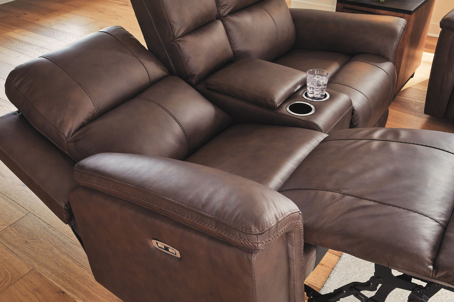 Bleckley - Power Reclining Loveseat With Console / Adjustable Headrest - Hornell Furniture Outlet