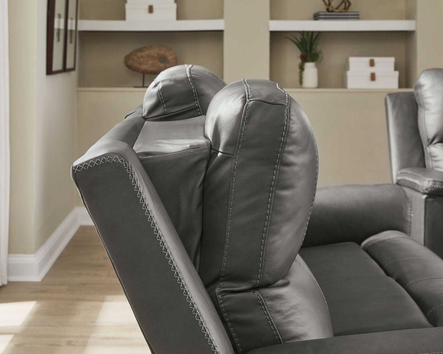 Bleckley - Power Reclining Loveseat With Console / Adjustable Headrest - Hornell Furniture Outlet