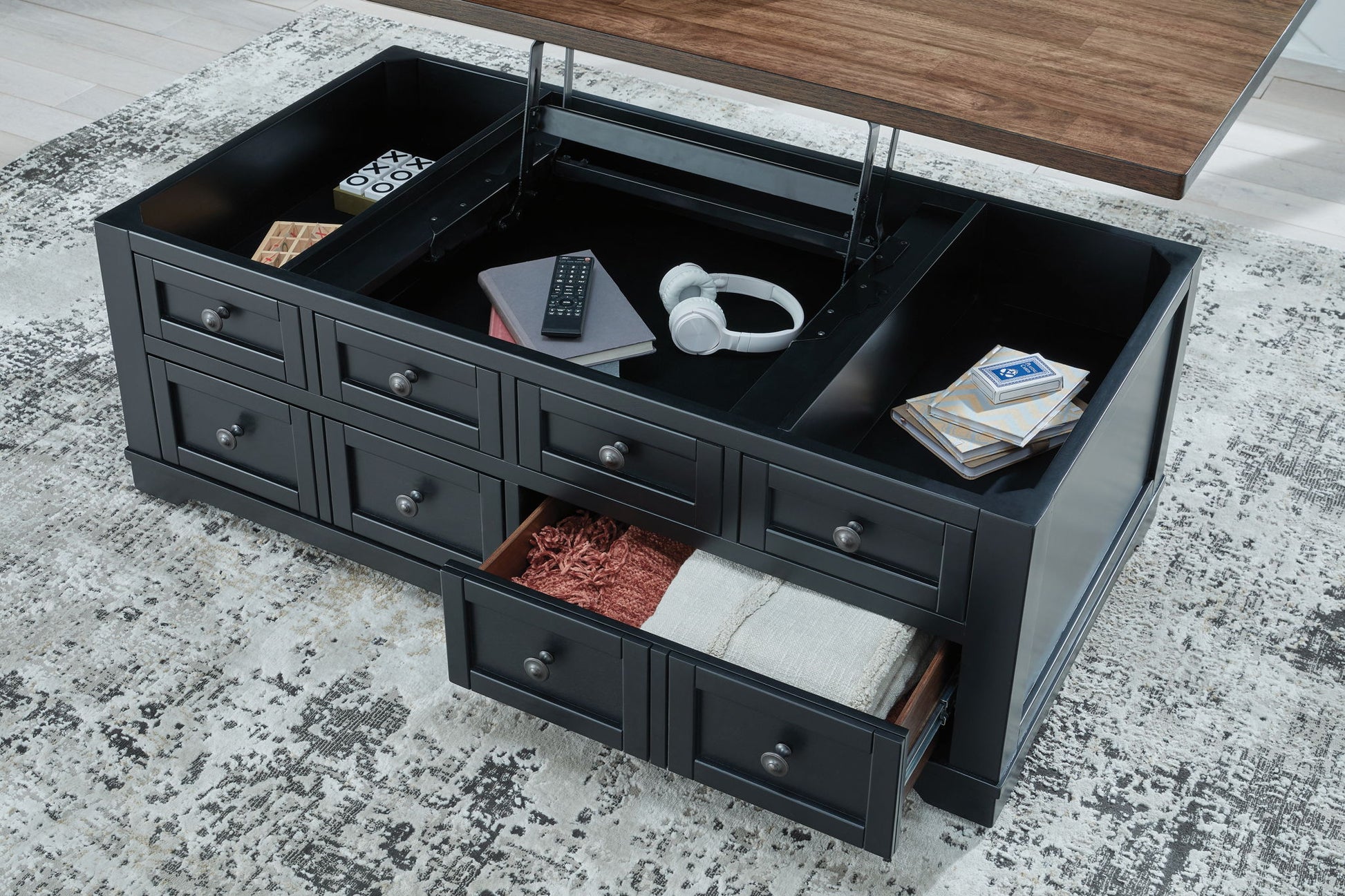 Wildenauer - Brown / Black - Lift Top Cocktail Table - Hornell Furniture Outlet