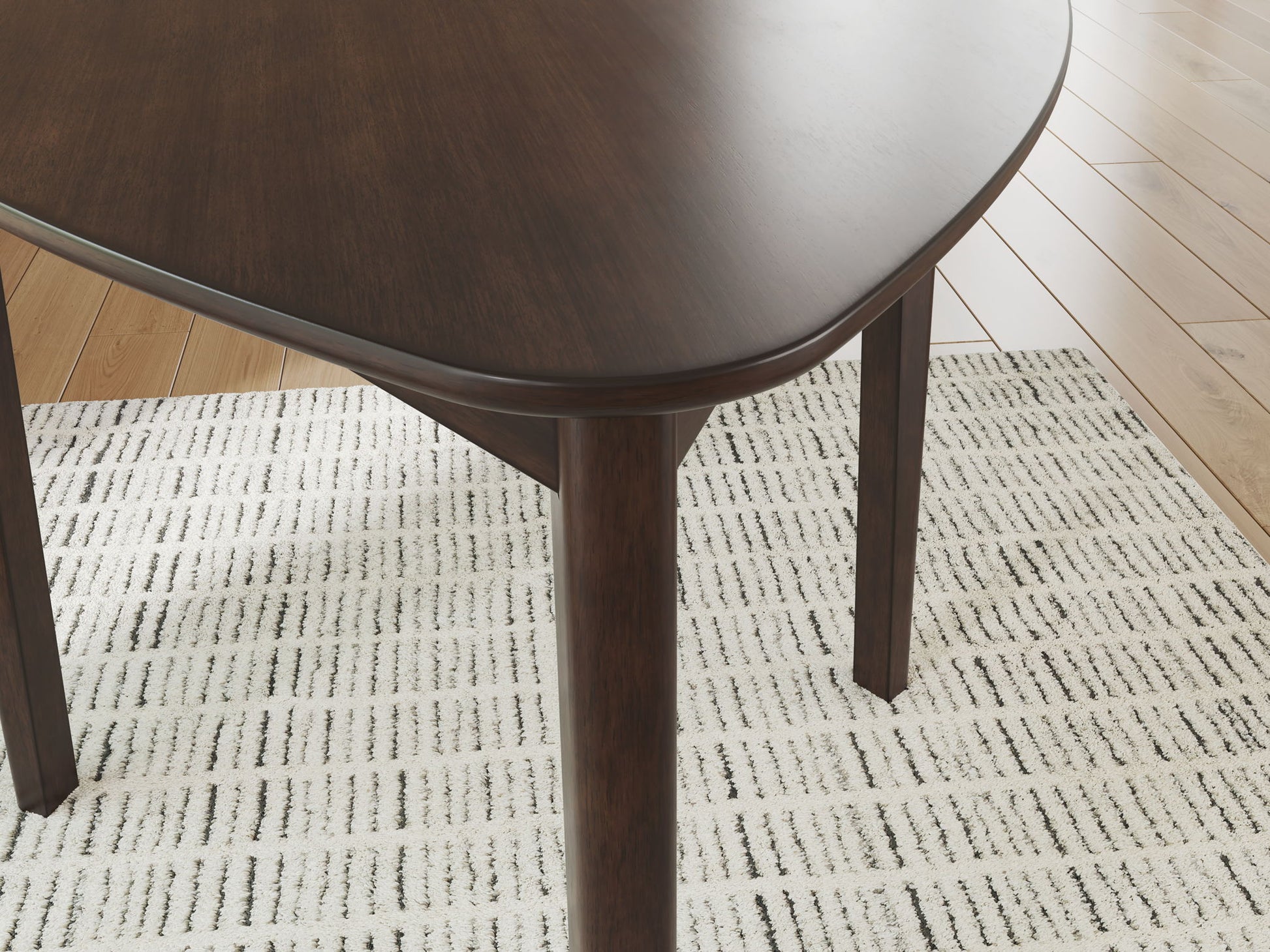 Mallenette - Triangle Dining Room Table - Merlot - Hornell Furniture Outlet