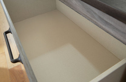 Bronyan - Dark Gray - Four Drawer Chest - Hornell Furniture Outlet