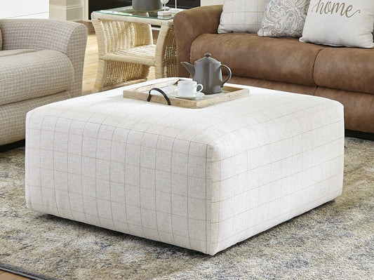 Justine - Castered Cocktail Ottoman - Wheat - Hornell Furniture Outlet