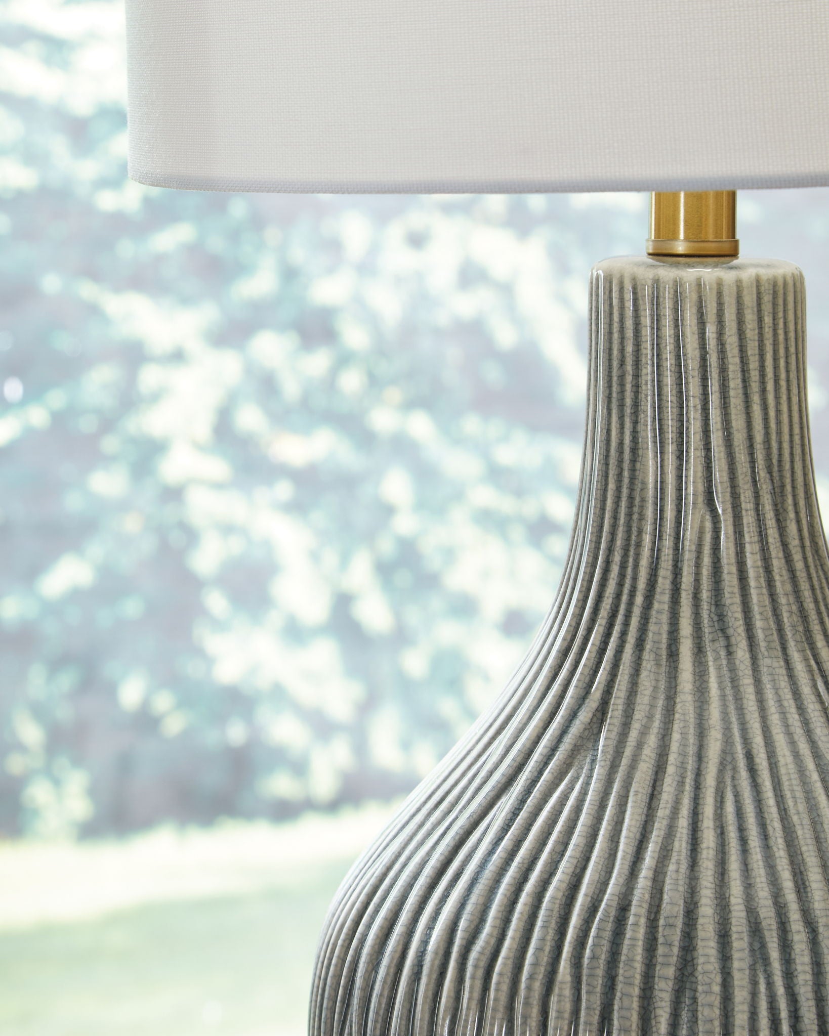 Judlen - Gray / Gold Finish - Ceramic Table Lamp - Hornell Furniture Outlet