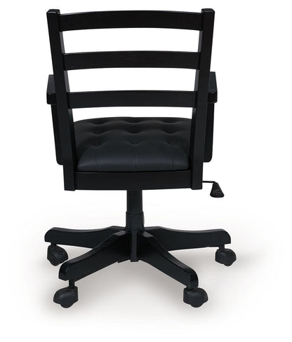 Wildenauer - Brown / Black - 4 Pc. - Home Office Desk And Return, Swivel Desk Chair, Bookcase - Hornell Furniture Outlet