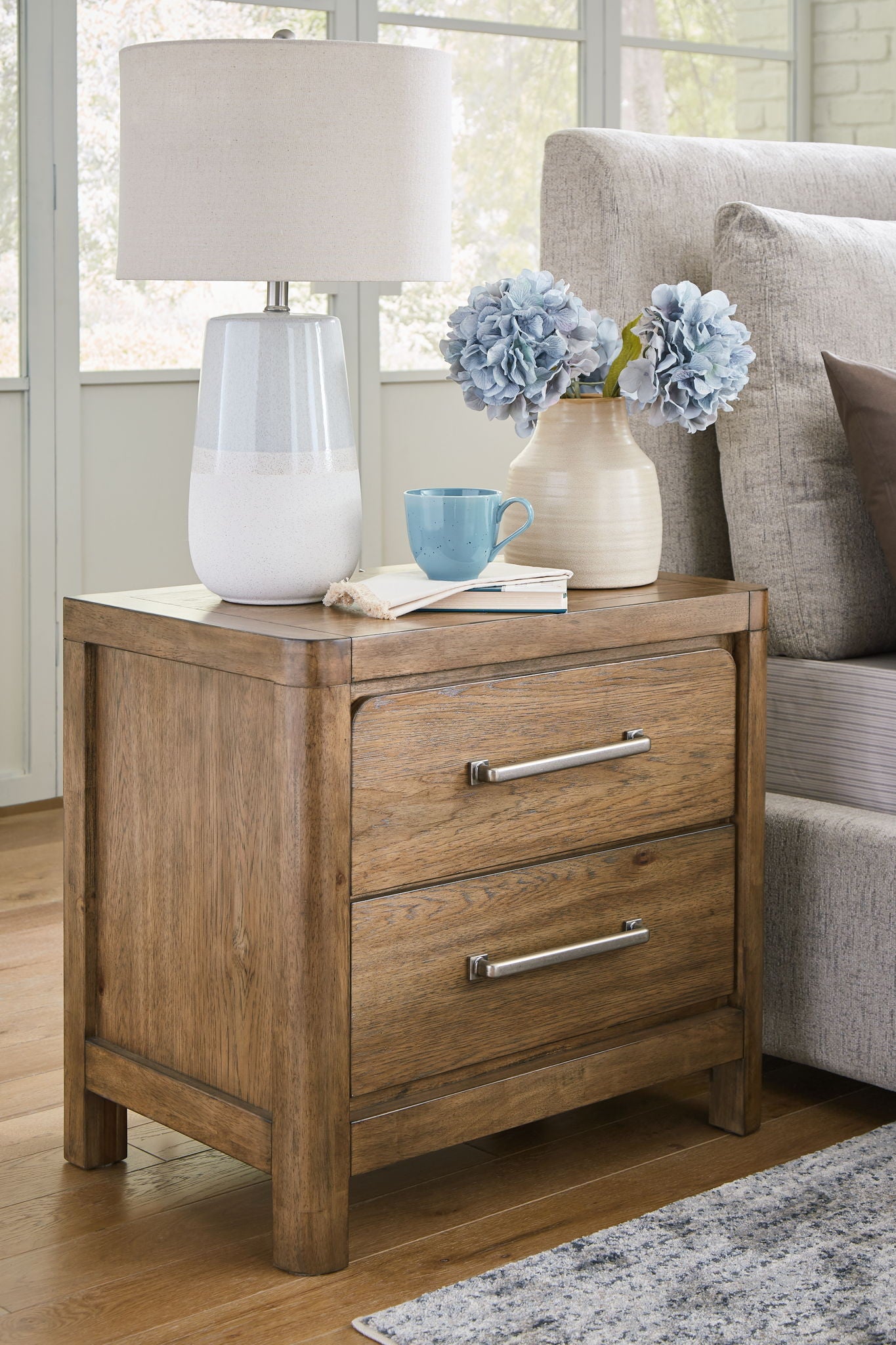 Cabalynn - Light Brown - Two Drawer Night Stand - Hornell Furniture Outlet