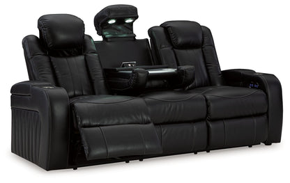 Caveman Den - Midnight - Power Reclining Sofa With Adj Headrest - Hornell Furniture Outlet