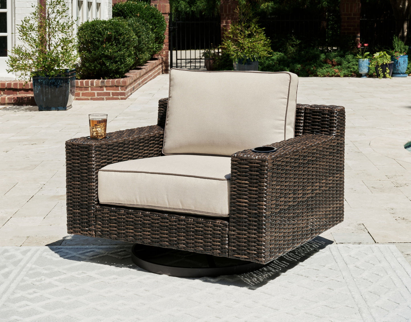 Coastline Bay - Brown - Swivel Lounge W/ Cushion - Hornell Furniture Outlet