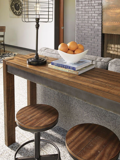 Torjin - Dark Brown - 3 Pc. - Long Counter Table, 2 Stools - Hornell Furniture Outlet