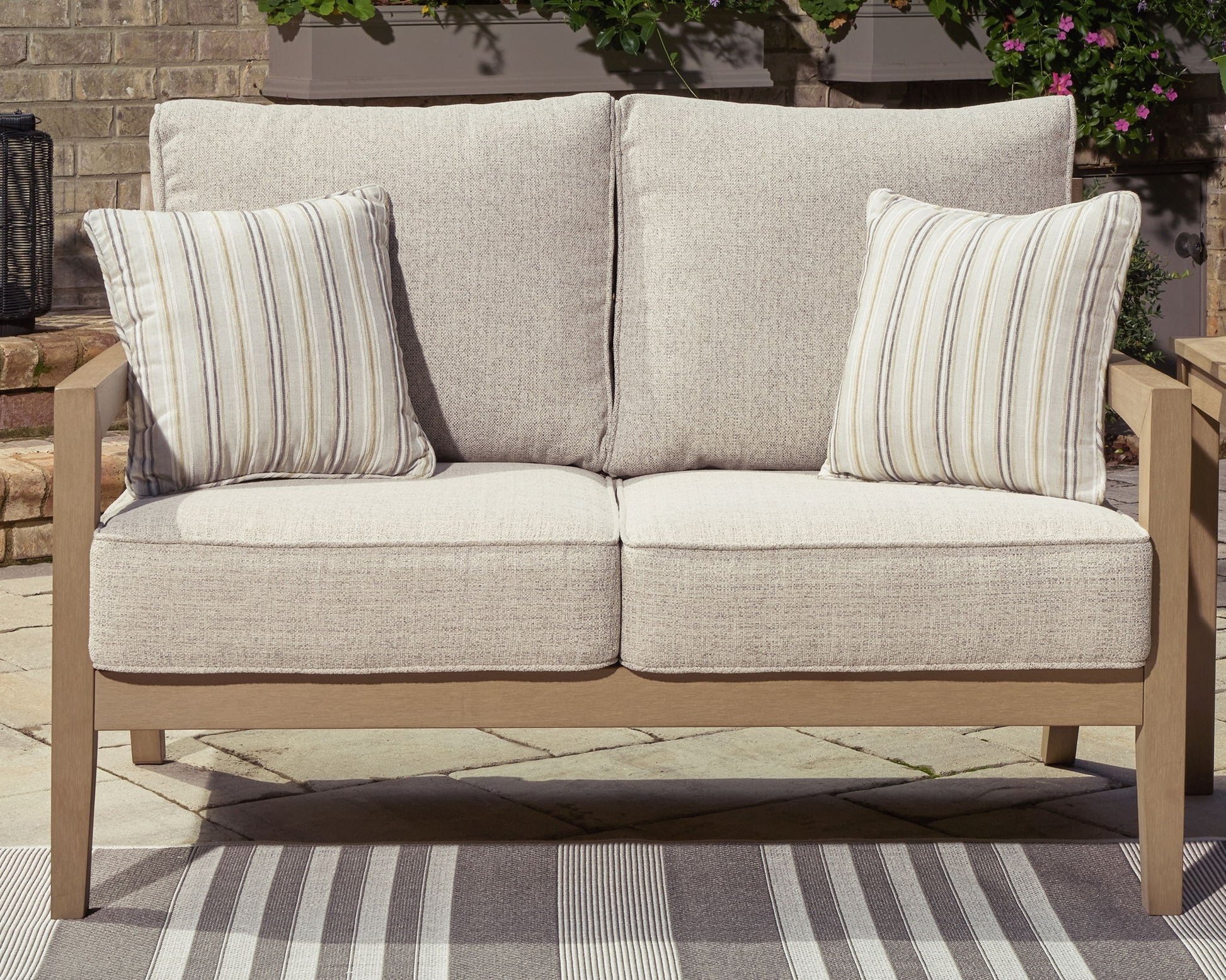 Hallow Creek - Driftwood - Loveseat With Cushion - Hornell Furniture Outlet