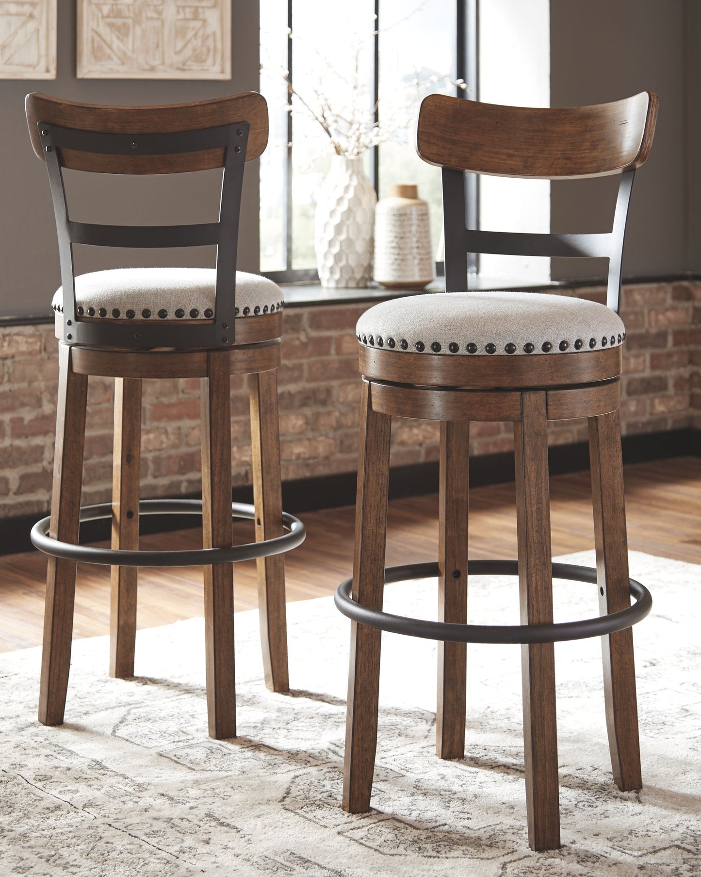 Valebeck - Tall Upholstered Swivel Barstool - Hornell Furniture Outlet
