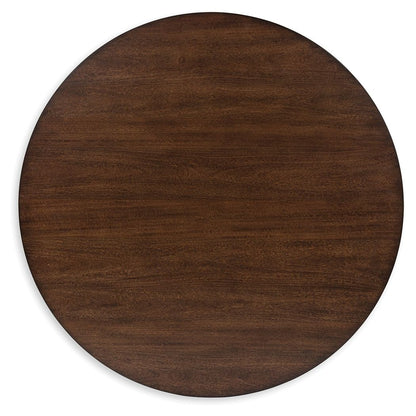 Korestone 2 - Dark Brown - Round Cocktail Table - Hornell Furniture Outlet