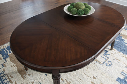 Lavinton - Brown - Oval Dining Room Extension Table - Hornell Furniture Outlet