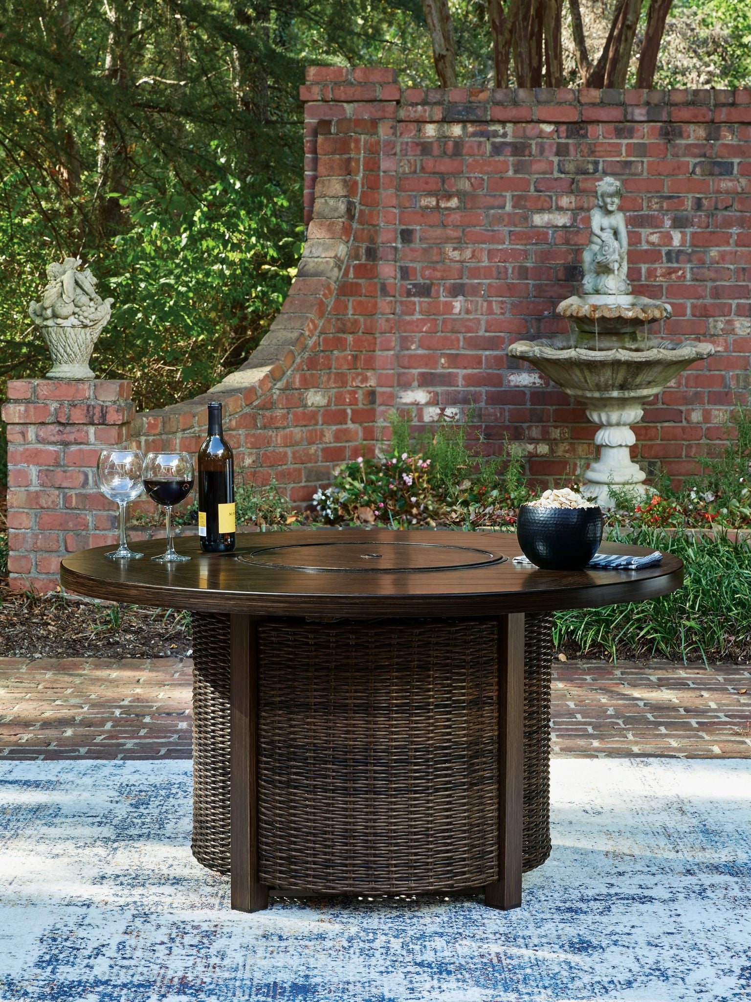 Monterey Point - Round Fire Pit Table - Dark Brown - Hornell Furniture Outlet