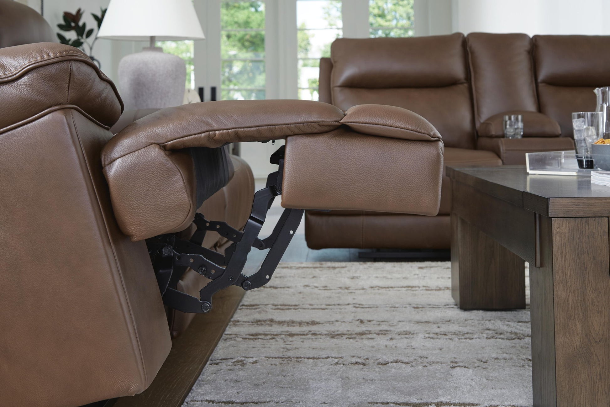 Vonryan - Power Reclining Sofa With Adj Headrest - Tobacco - Hornell Furniture Outlet