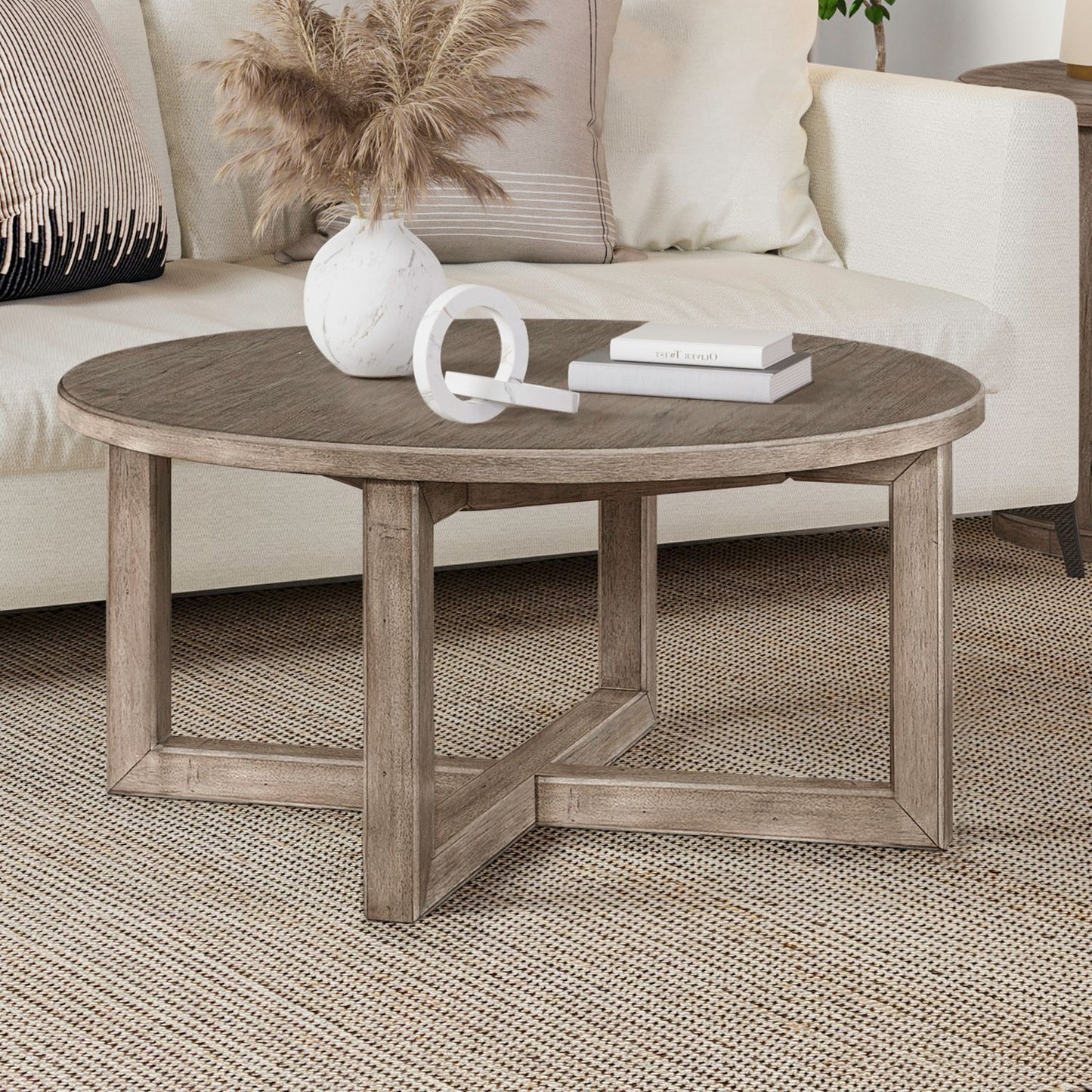 Proximity Place - Round Cocktail Table - Light Brown - Hornell Furniture Outlet