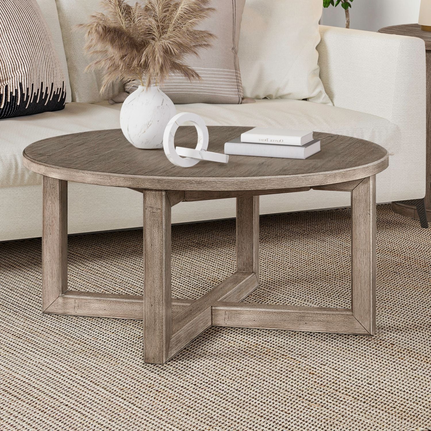 Proximity Place - Round Cocktail Table - Light Brown - Hornell Furniture Outlet