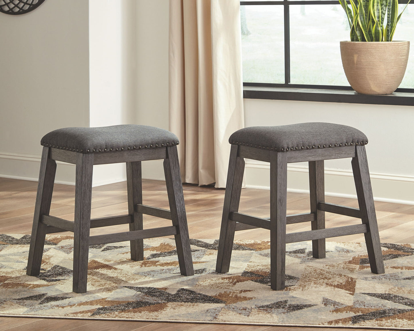 Caitbrook - Gray - Upholstered Stool (Set of 2) - Hornell Furniture Outlet