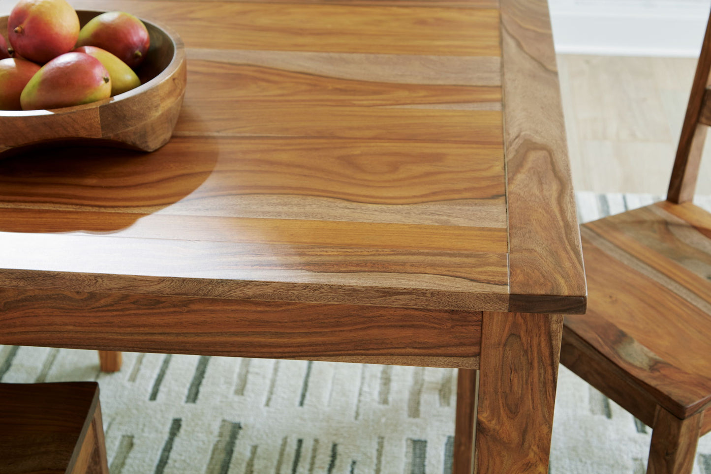 Dressonni - Brown - Rectangular Dining Room Butterfly Extension Table - Hornell Furniture Outlet