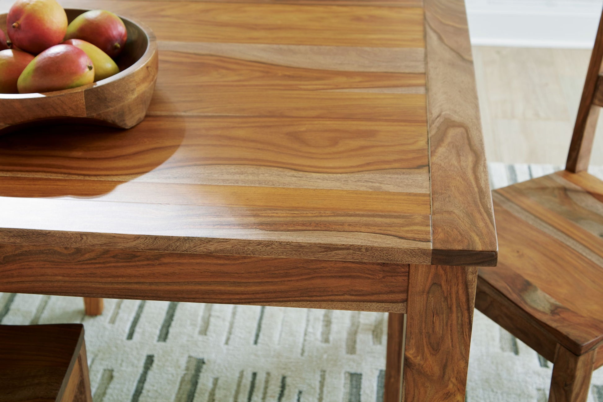 Dressonni - Brown - Rectangular Dining Room Butterfly Extension Table - Hornell Furniture Outlet