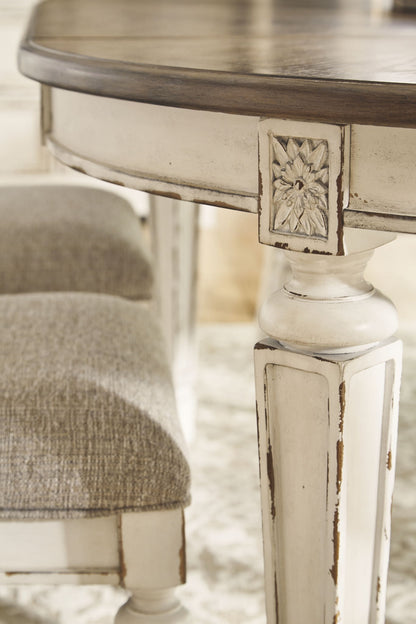 Realyn - Chipped White - Oval Dining Room Extension Table - Hornell Furniture Outlet