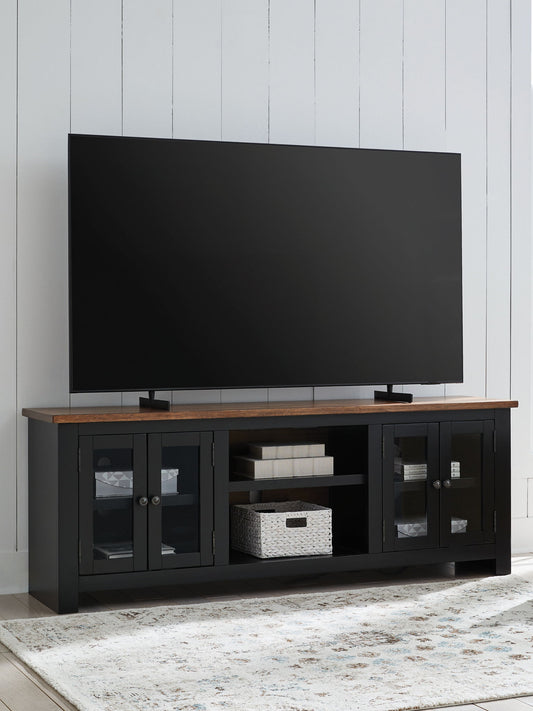 Wildenauer - Brown / Black - XL TV Stand With Fireplace Option - Hornell Furniture Outlet
