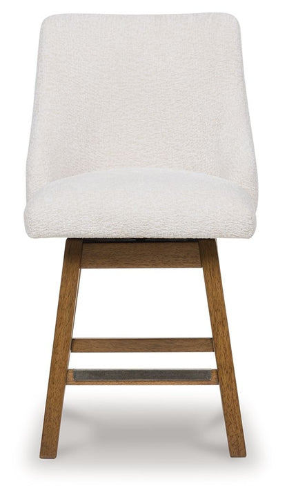 Cabalynn - Oatmeal / Light Brown - Upholstered Swivel Barstool (Set of 2) - Hornell Furniture Outlet