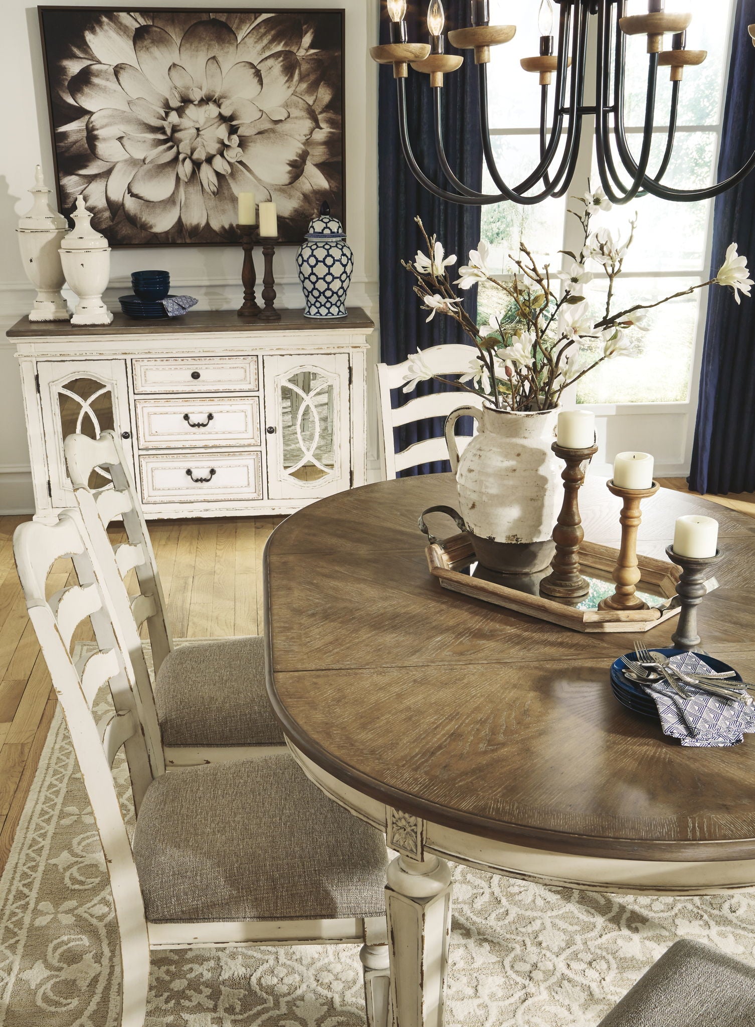 Realyn - Oval Dining Room Extension Table - Chipped White - Hornell Furniture Outlet