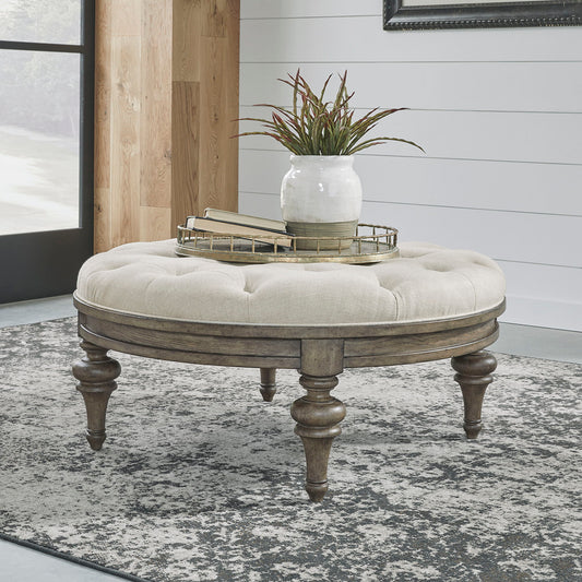 Americana Farmhouse - Round Cocktail Ottoman - Light Brown - Hornell Furniture Outlet