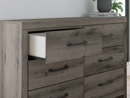 Graystorm - Brown Gray - Six Drawer Dresser - Hornell Furniture Outlet