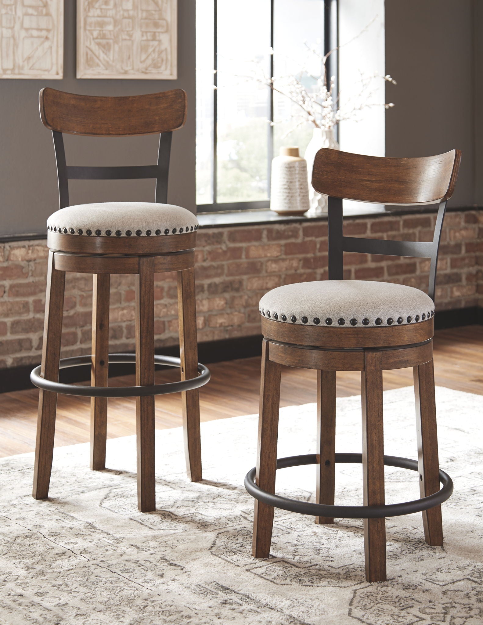 Valebeck - Tall Upholstered Swivel Barstool - Hornell Furniture Outlet