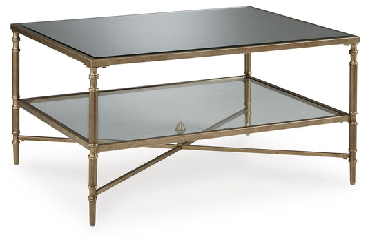 Cloverty - Aged Gold Finish - Rectangular Cocktail Table - Hornell Furniture Outlet