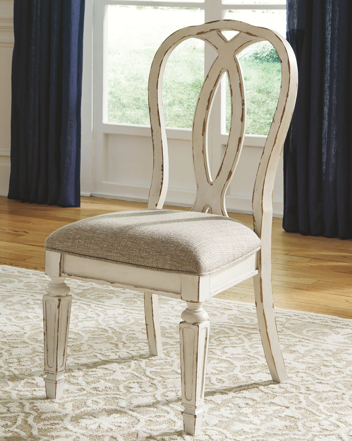 Realyn - Oval Dining Table Set - Hornell Furniture Outlet