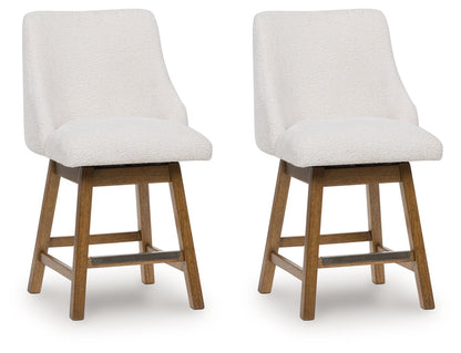 Cabalynn - Oatmeal / Light Brown - Upholstered Swivel Barstool (Set of 2) - Hornell Furniture Outlet