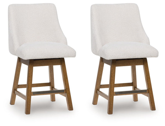 Cabalynn - Oatmeal / Light Brown - Upholstered Swivel Barstool (Set of 2) - Hornell Furniture Outlet