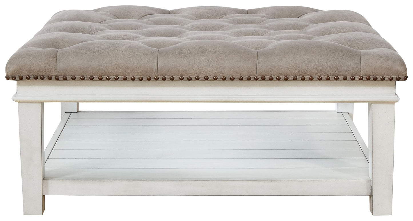 Kanwyn - Whitewash - Uph Ottoman Cocktail Table - Hornell Furniture Outlet
