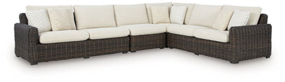 Kimora - 7 Pc. - 4 - Piece Outdoor Sectional, Swivel Glider Lounge, Cocktail Table, End Table - Beige / Dark Brown - Hornell Furniture Outlet