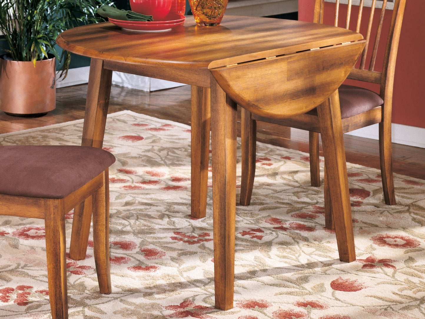 Berringer - Rustic Brown - Round DRM Drop Leaf Table - Hornell Furniture Outlet
