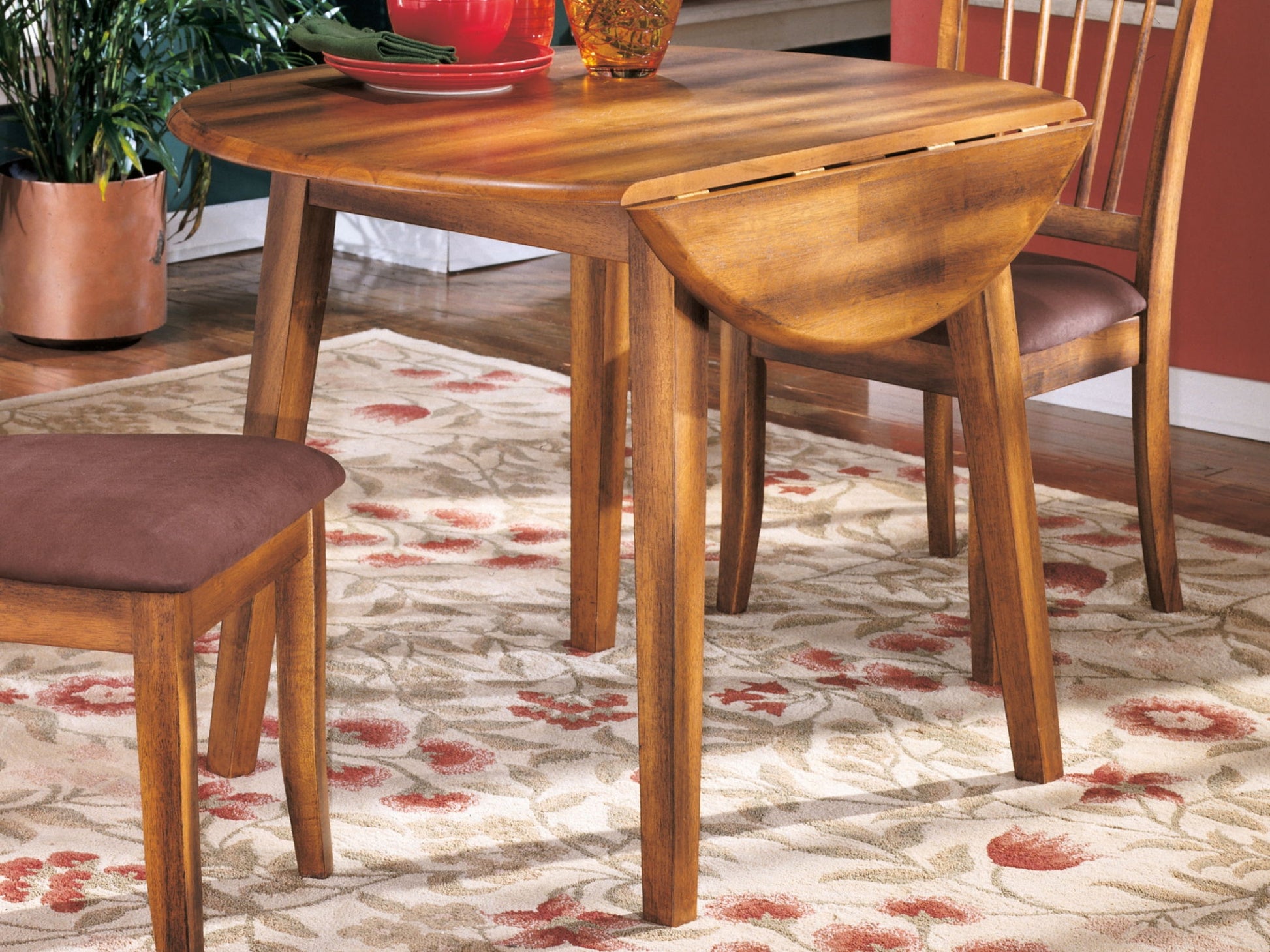 Berringer - Rustic Brown - Round DRM Drop Leaf Table - Hornell Furniture Outlet
